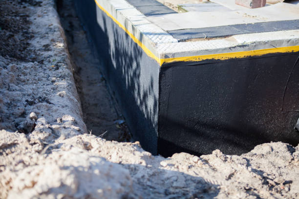 Professional Waterproofing technician working in Enon, VA